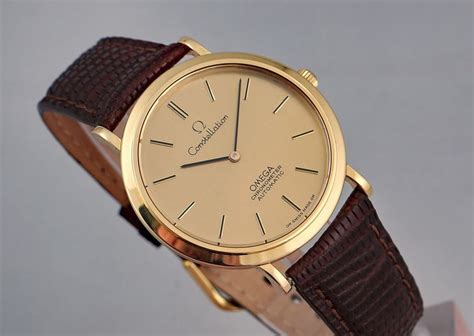 omega ultra thin gold watch